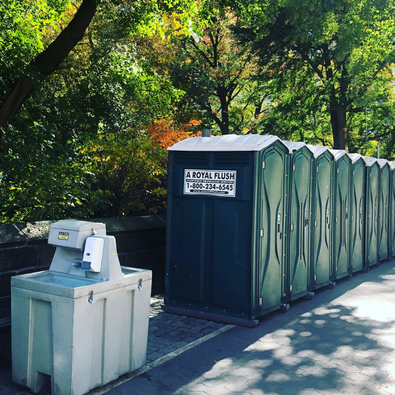 Portable toilet services with hand washing stations